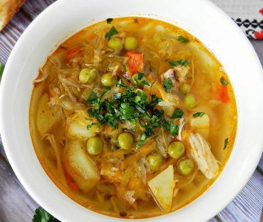 Shchi (Cabbage Soup) with Fresh Cabbage, Pickled Cucumbers, and Peas